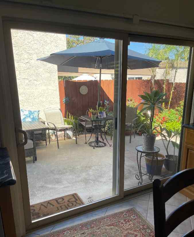 Smooth-rolling patio sliding door after CaliberFix repair — Jacksonville, FL